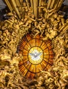 Dove of the Holy Spirit stained glass built by Gian Lorenzo Bernini in 1660 inside St. Petrs's basilica Royalty Free Stock Photo